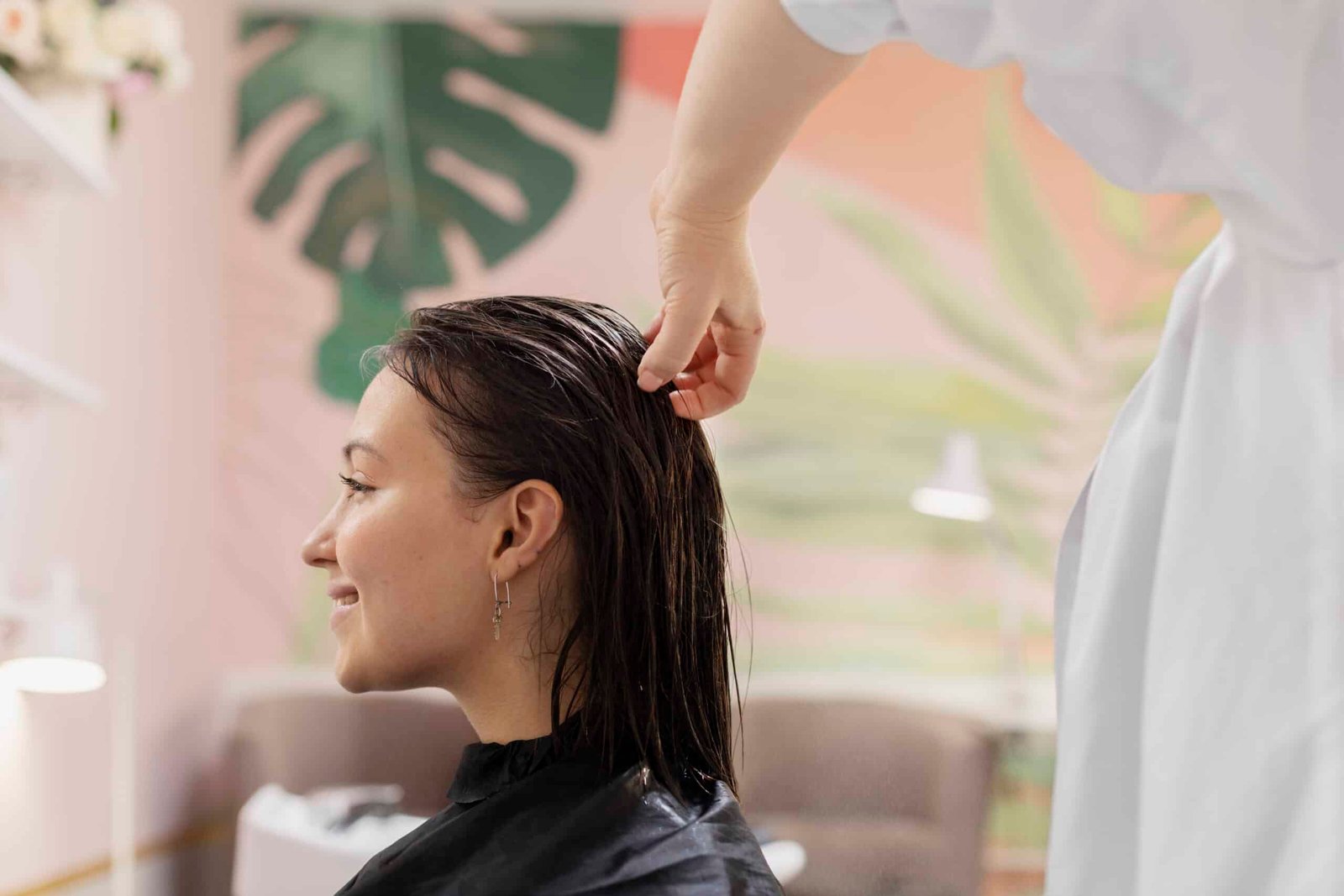Dry Hair in Dubai 4 Stylist performing a dry hair repair treatment at Sasha Beauty Salon Dubai